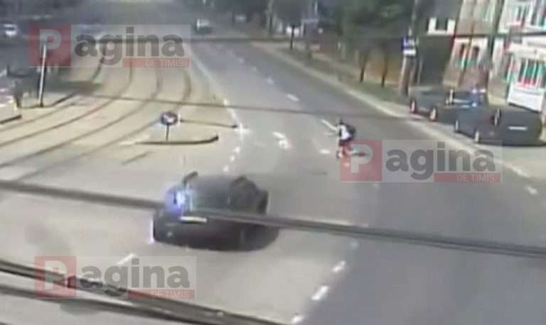 Femeie spulberată pe trecerea de pietoni