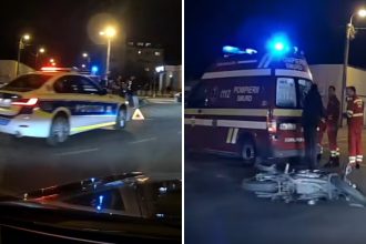 Motocicletă căzută pe asfalt într-o intersecție din Timișoara, după un accident ușor.