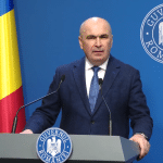Premierul Ilie Bolojan anunțând încetarea colaborării PNL cu PSD și începerea negocierilor pentru un guvern minoritar.