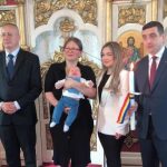 George Simion și Valer Kovacs la ceremonia de botez din Timișoara, marcând relația personală și politică dintre cei doi.