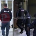 Polițiști din cadrul SICE Timiș verificând pachete cu haine contrafăcute găsite în containere la marginea Timișoarei.