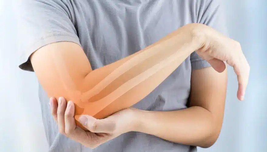Infografic cu simptomele deficitului de calciu: crampe, unghii fragile și iritabilitate.