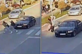Echipaj medical acordând primul ajutor unei adolescente lovite pe trecerea de pietoni de pe strada Principală din Buziaș.