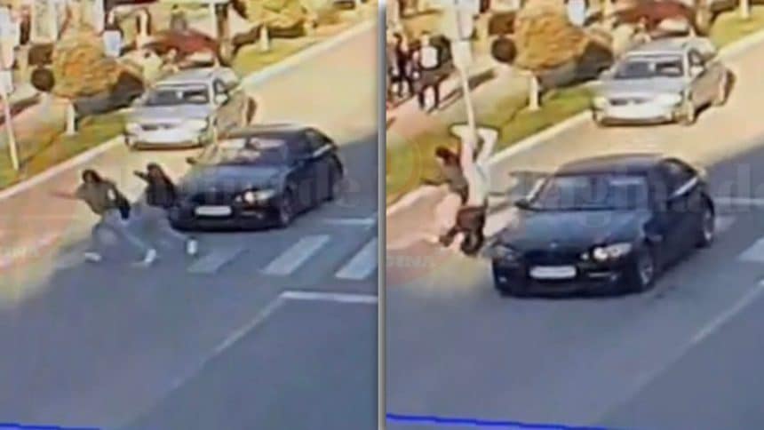 Echipaj medical acordând primul ajutor unei adolescente lovite pe trecerea de pietoni de pe strada Principală din Buziaș.