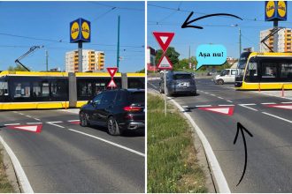 Noile indicatoare rutiere și marcaje de pe carosabil în sensul giratoriu de la AEM, indicând prioritatea tramvaiului față de autoturisme.