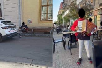 Poliția Locală Timișoara legitimând un cântăreț stradal fără autorizație pe strada Alba Iulia.
