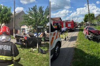 Echipaje de descarcerare ISU Timiș intervenind pentru salvarea unei femei blocate într-o mașină răsturnată în Dudeștii Noi.