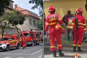 Autospeciale de stingere ale ISU Timiș intervenind de urgență la un incendiu izbucnit într-un bloc de locuințe pe strada Paris din Timișoara.