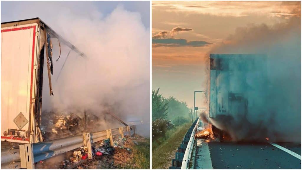 Autospeciale de pompieri intervenind pe banda de urgență a autostrăzii A1 pentru stingerea unui incendiu izbucnit la un autotren.