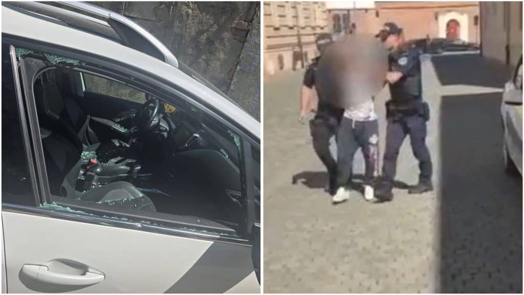 Geam lateral al unei mașini parcate spart cu o piatră în urma unui jaf de camere de bord pe o stradă din Timișoara.
