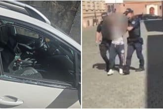 Geam lateral al unei mașini parcate spart cu o piatră în urma unui jaf de camere de bord pe o stradă din Timișoara.