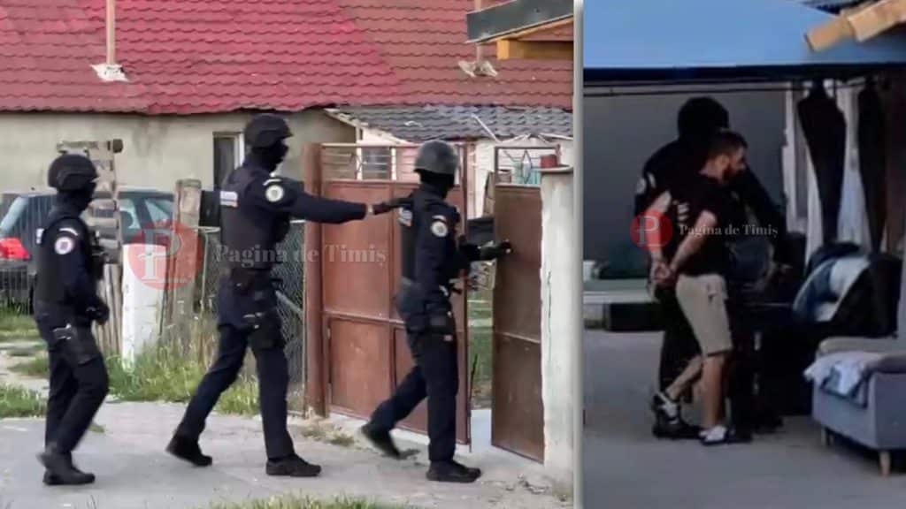 Mascați și polițiști de la Transporturi Feroviare blocând o stradă din Sânandrei în timpul executării unor mandate de percheziție domiciliară.