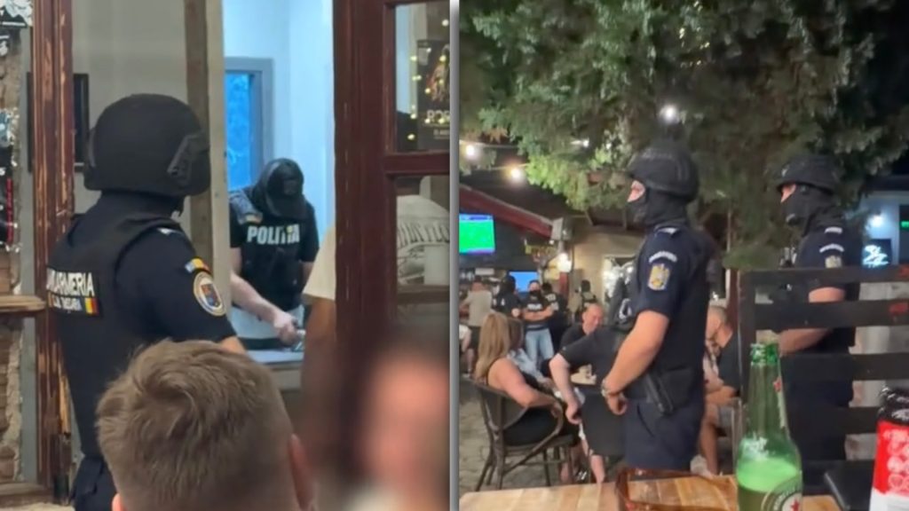 Cadre ale trupelor speciale de intervenție participând la perchezițiile domiciliare din Deva într-un dosar DIICOT de trafic de droguri de mare risc.