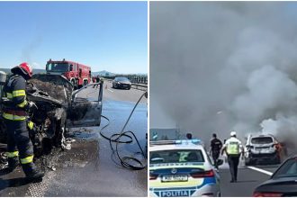 Autoturism cuprins în totalitate de flăcări pe banda de urgență a autostrăzii A1, în zona localității Ilia, generând o coloană groasă de fum negru.