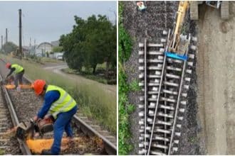 Excavatoare și utilaje grele lucrând la nivelarea terasamentului feroviar golit de șine între Ghiroda și Pădurea Verde.