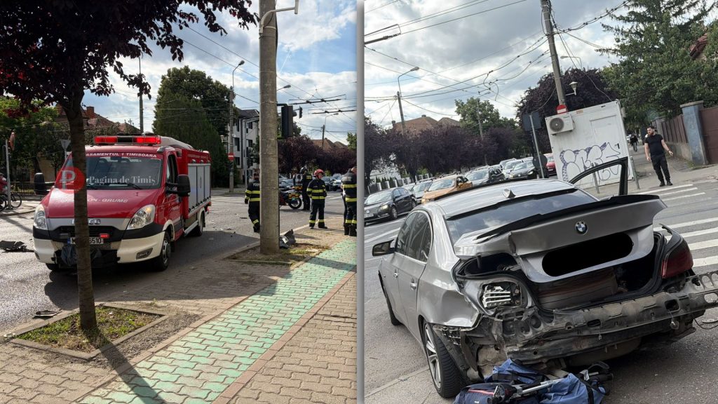 Două autoturisme marca BMW avariate pe strada Cluj din Timișoara, în urma unei coliziuni provocate de neacordarea de prioritate la virajul la stânga.