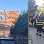 Echipaje de pompieri ale ISU Timiș desfășurând o saltea pneumatică la baza unui bloc de pe strada Luceafărului în timpul unei tentative de suicid.
