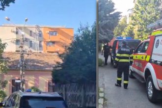 Echipaje de pompieri ale ISU Timiș desfășurând o saltea pneumatică la baza unui bloc de pe strada Luceafărului în timpul unei tentative de suicid.