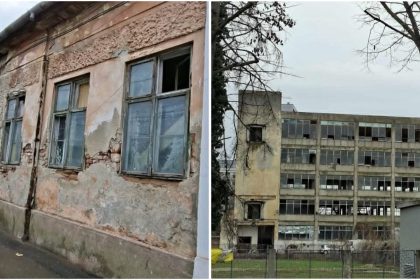 Fațadă degradată a unui imobil istoric din Timișoara, cu plase de protecție montate pentru a preveni căderea tencuielii peste pietoni.