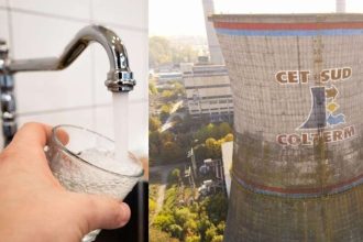 Muncitori efectuând reparații la o magistrală subterană de termoficare pentru reluarea furnizării de apă caldă.