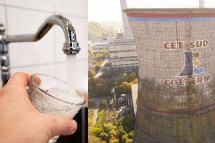 Muncitori efectuând reparații la o magistrală subterană de termoficare pentru reluarea furnizării de apă caldă.