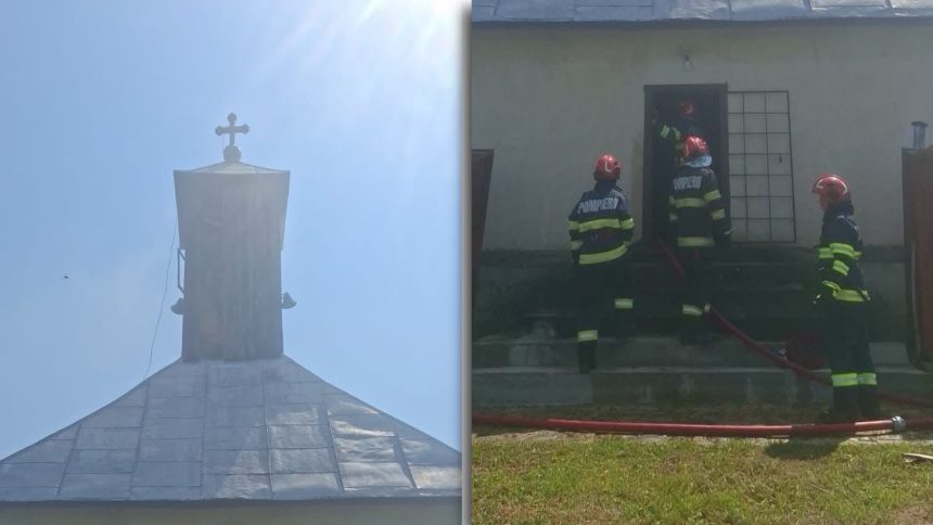 Autospecială de pompieri cu scară intervenind de urgență pentru stingerea unui incendiu izbucnit la turla unei biserici.