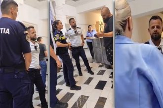 Polițiști din cadrul IPJ Timiș intervenind în holul Primăriei Timișoara pentru a aplana un conflict legat de accesul în instituție.