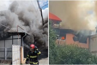 Incendiu devastator la acoperișul unei case din Reșița, pe strada Petru Maior, cu nor gros de fum deasupra orașului