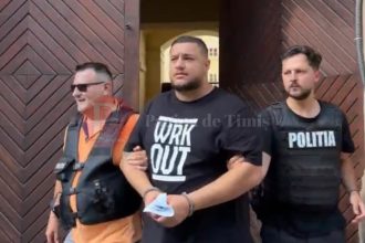 Alin Borcan escortat de polițiști spre Centrul de Reținere și Arestare Preventivă.