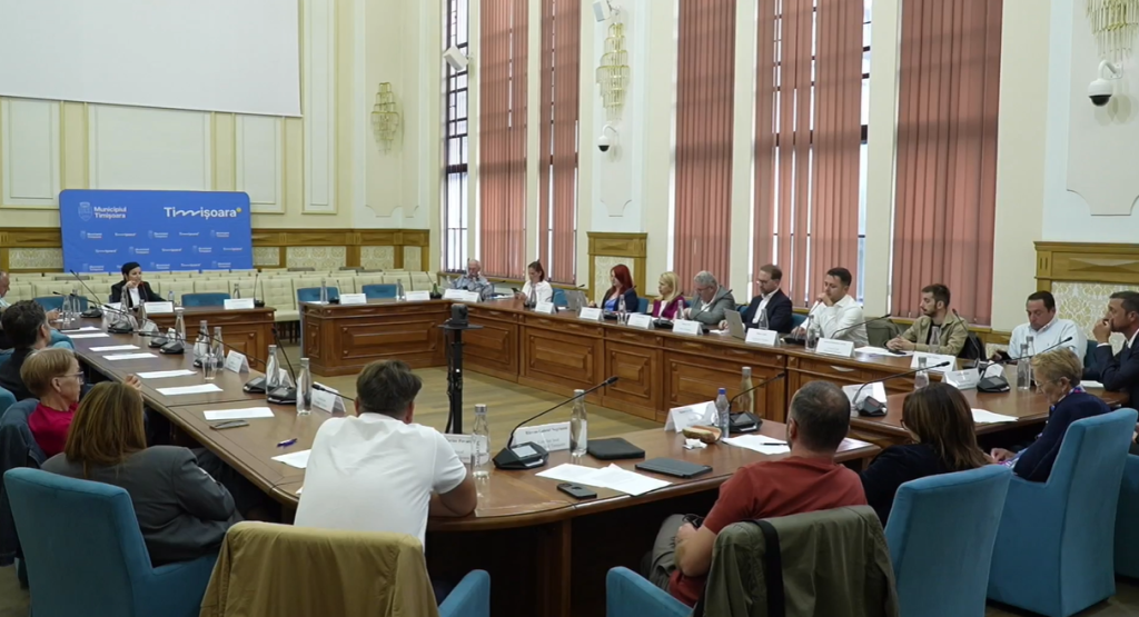 Sala de ședințe a Consiliului Local Timișoara în timpul dezbaterilor aprinse privind recuperarea prejudiciului ANAF de la STPT